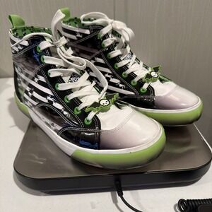 Edgy Black and White High-Top Sneakers with Green Accents